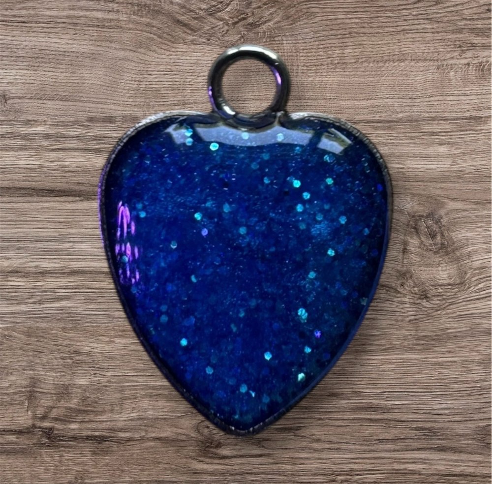 Blue glittery heart pendant