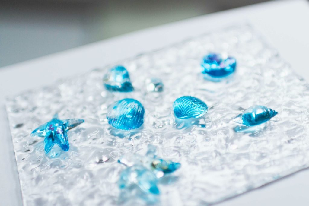 Blue seashells on textured background